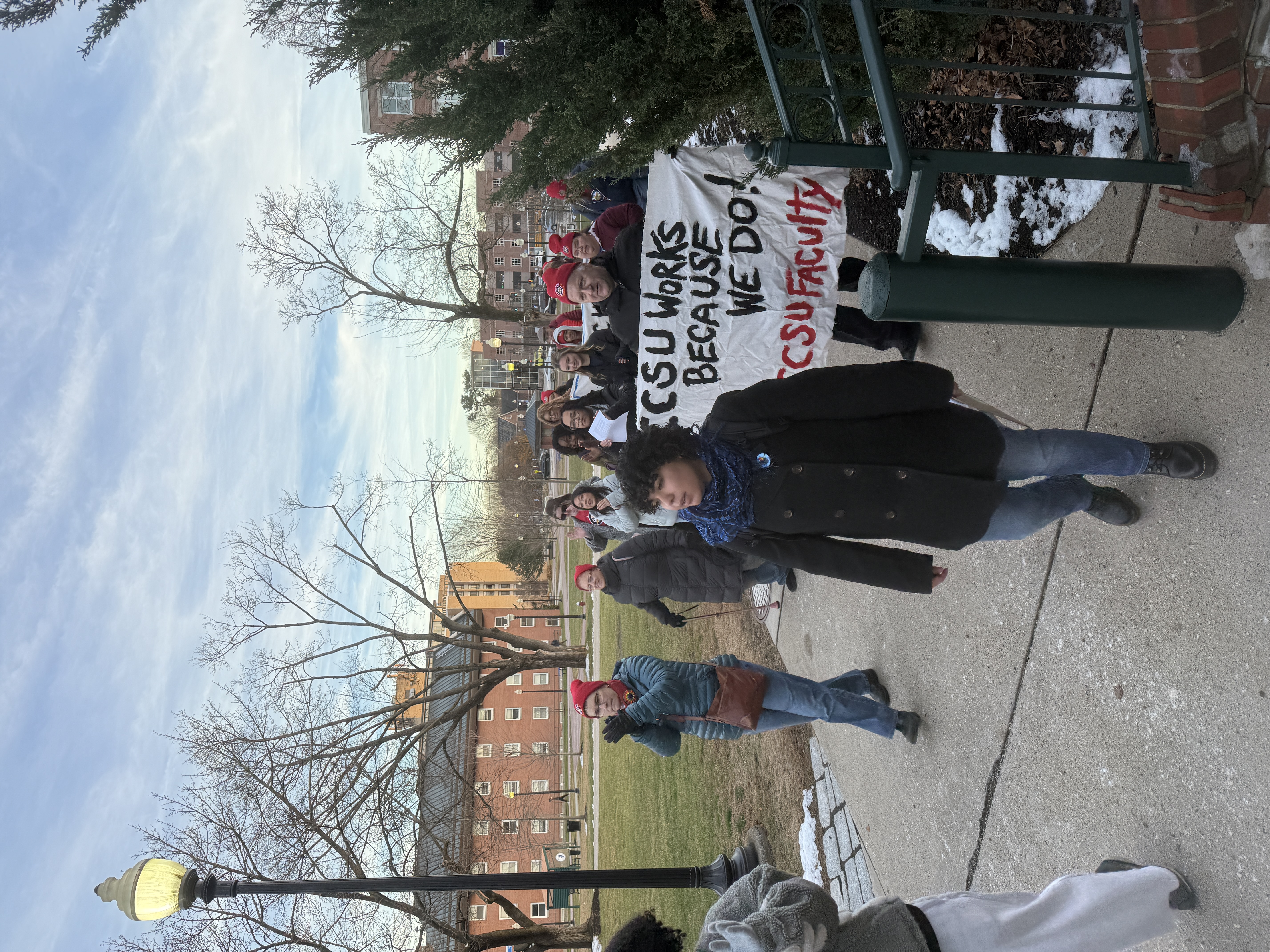 Students and faculty march on Central's campus to Davidson Hall to deliver the petition.